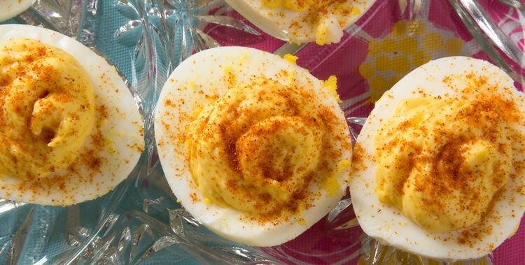 deviled eggs with paprika on top