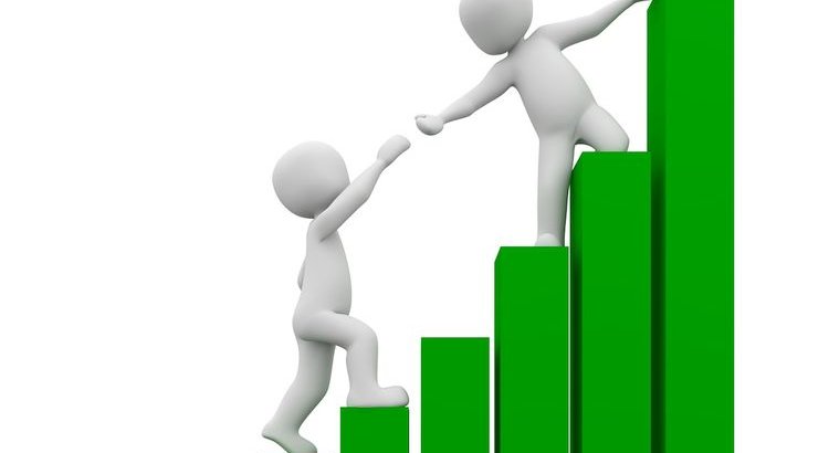 one helping another up a profit chart staircase