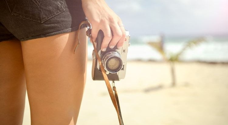 photographer holding camera